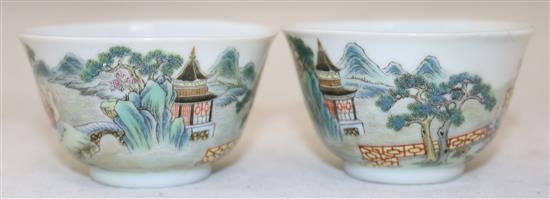 A pair of Chinese famille boys cups, Yongzheng marks, 18th/19th century, diameter 6.25cm, restored